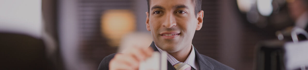 businessman with check card_image