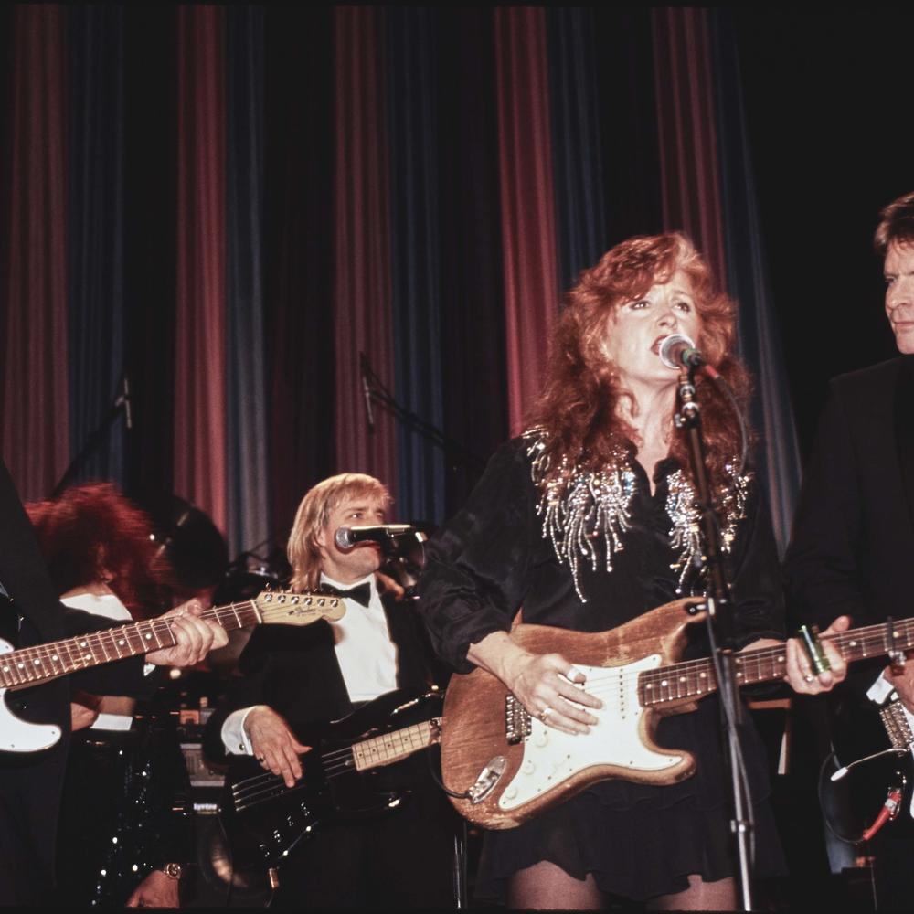 2000 Rock and Roll Hall of Fame Inductee Bonnie Raitt Onstage with Bruce Springsteen and John Fogarty at the Induction Ceremony