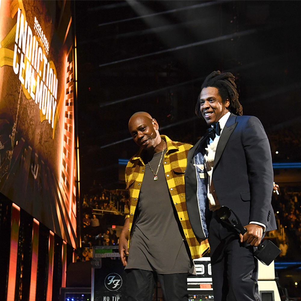 Dave Chappelle and JAY-Z at the 2021 Induction Ceremony