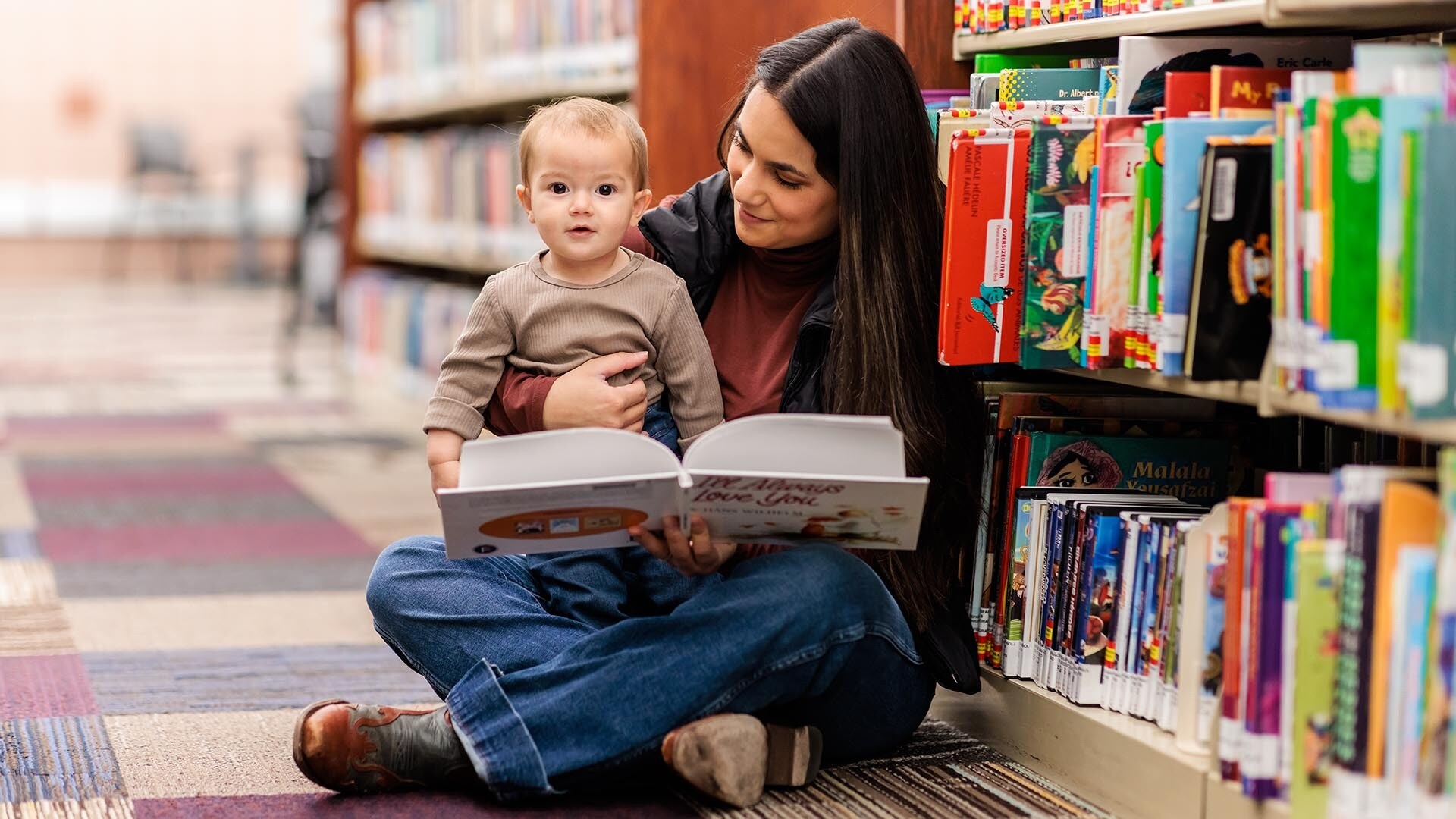 MSU Denver student Ayla Thompson and her baby daughter at Golden Library